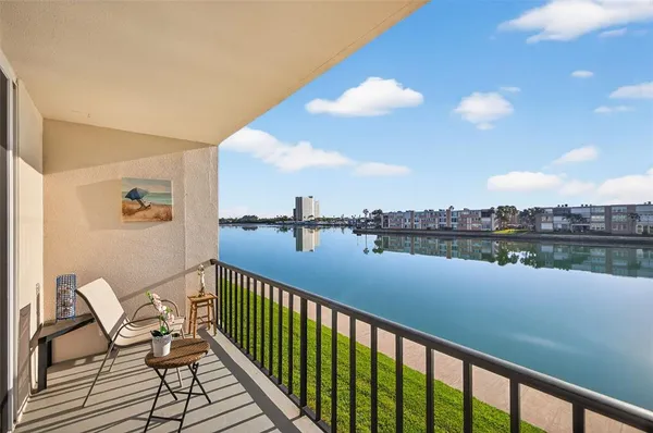 a view of a lake from a balcony
