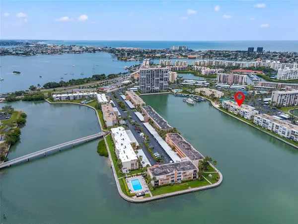 a view of a lake with a city