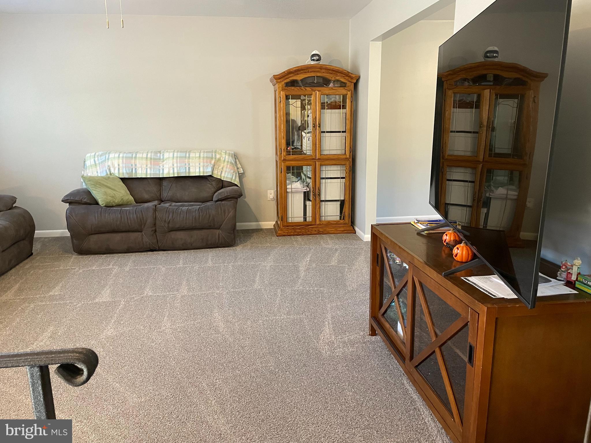 13710 South Springfield Road Brandywine, MD 20613 - Photo 21 of 64 a living room with furniture and a window