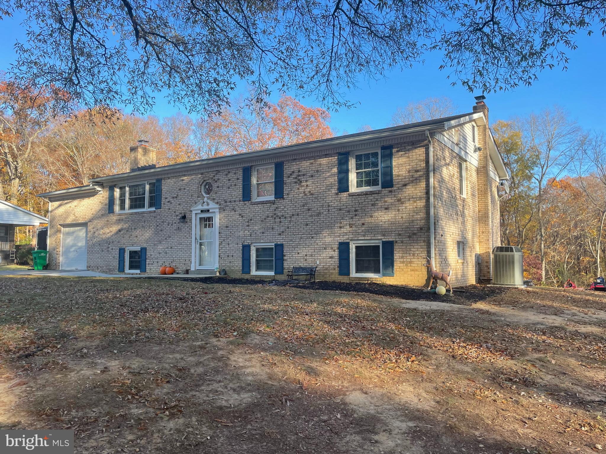 13710 South Springfield Road Brandywine, MD 20613 - Photo 4 of 64 a front view of a house with a yard