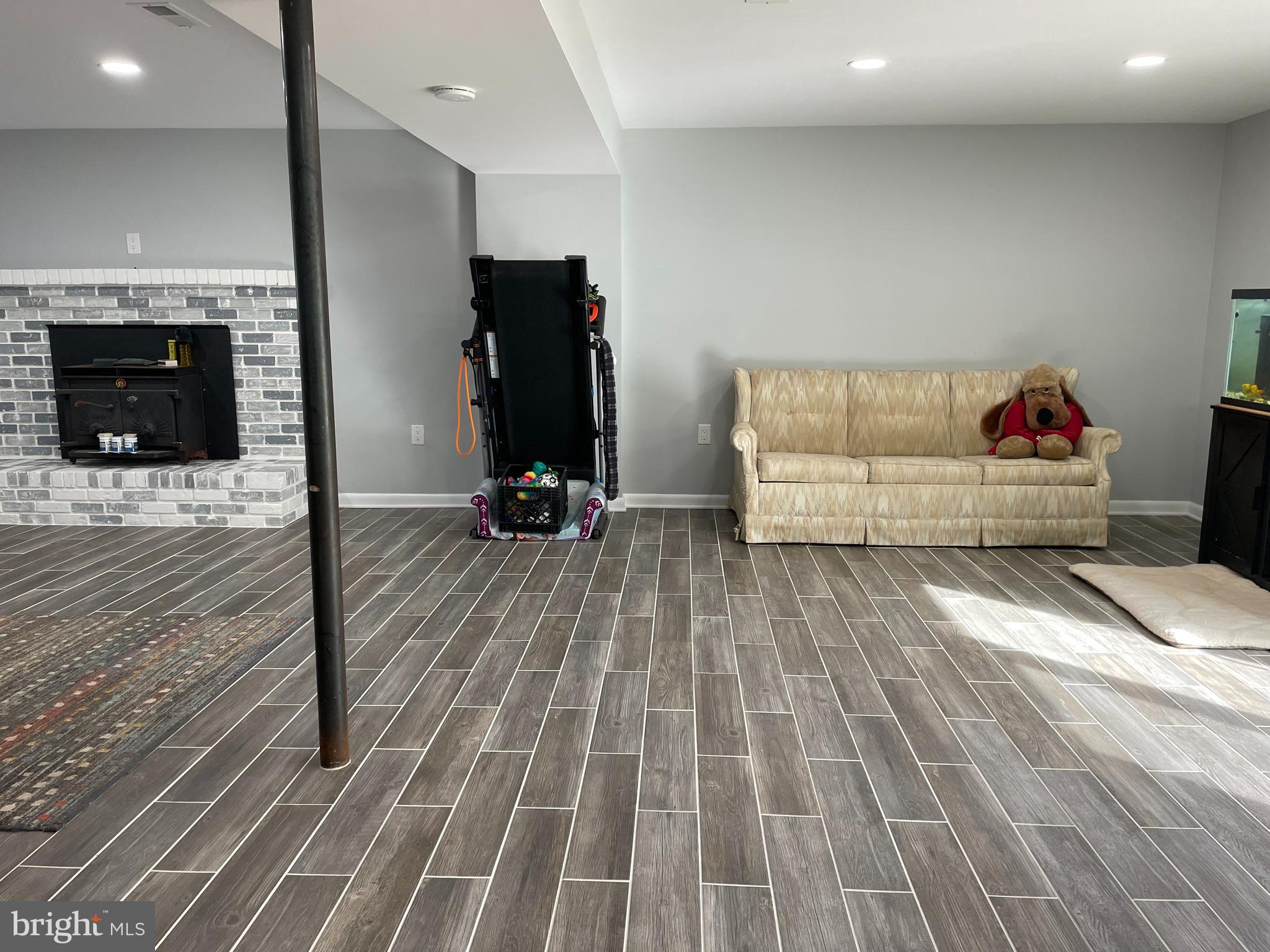 13710 South Springfield Road Brandywine, MD 20613 - Photo 45 of 64 a view of livingroom with furniture and fireplace
