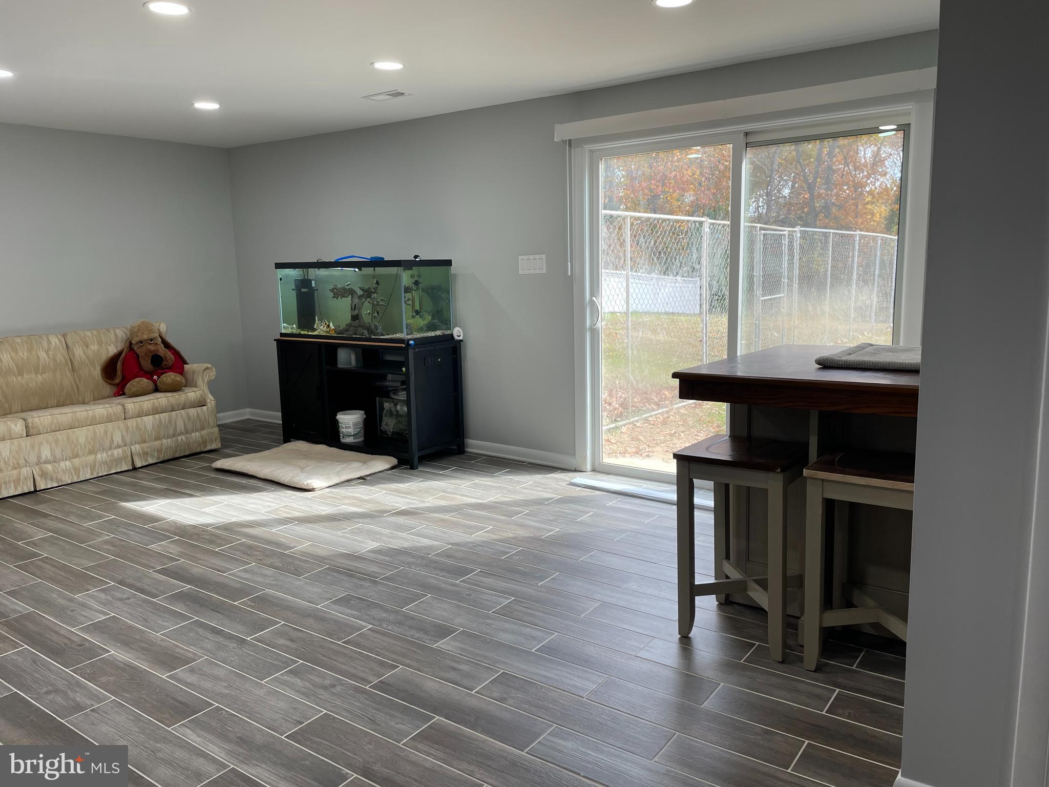 13710 South Springfield Road Brandywine, MD 20613 - Photo 46 of 64 a living room with furniture and a wooden floor