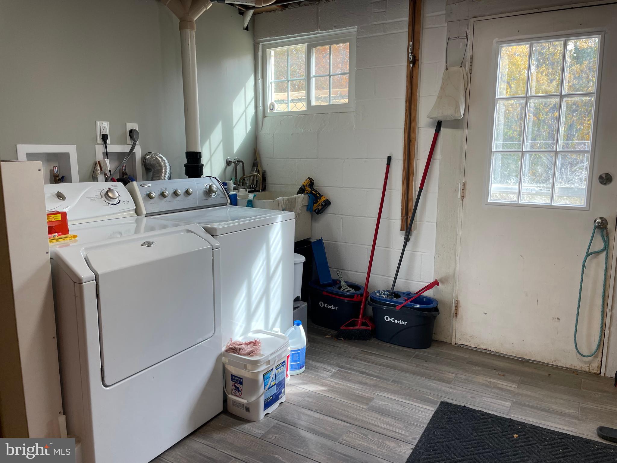 13710 South Springfield Road Brandywine, MD 20613 - Photo 56 of 64 a utility room with dryer and washer