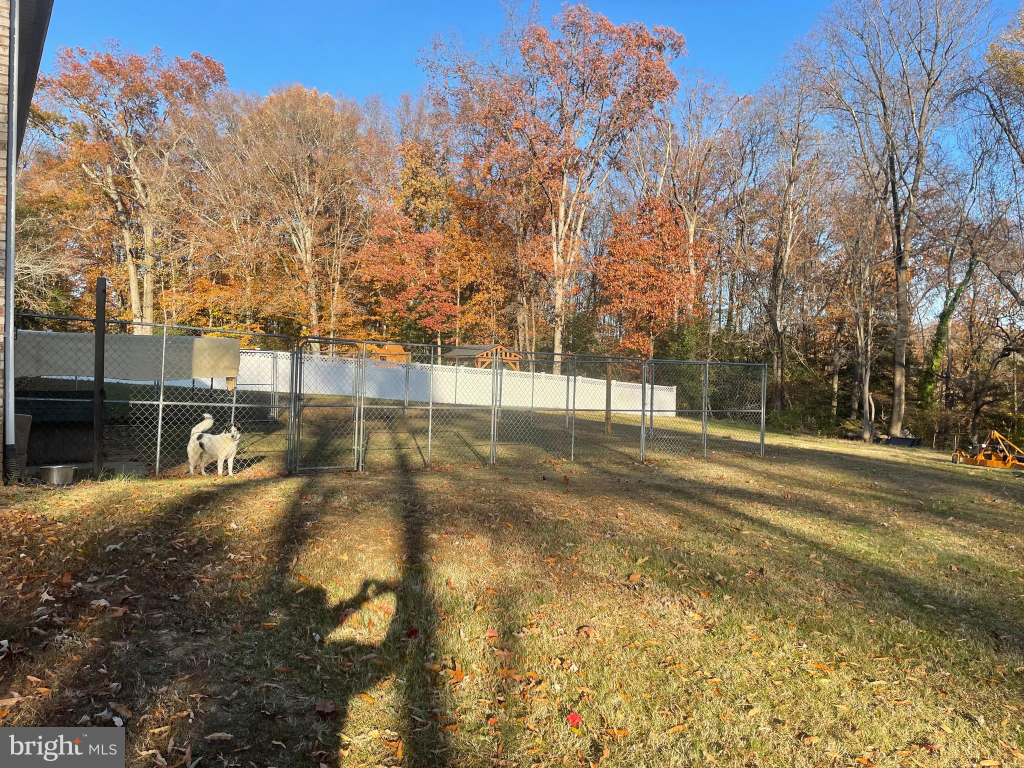 13710 South Springfield Road Brandywine, MD 20613 - Photo 8 of 64 a view of a swimming pool with an outdoor space and seating area