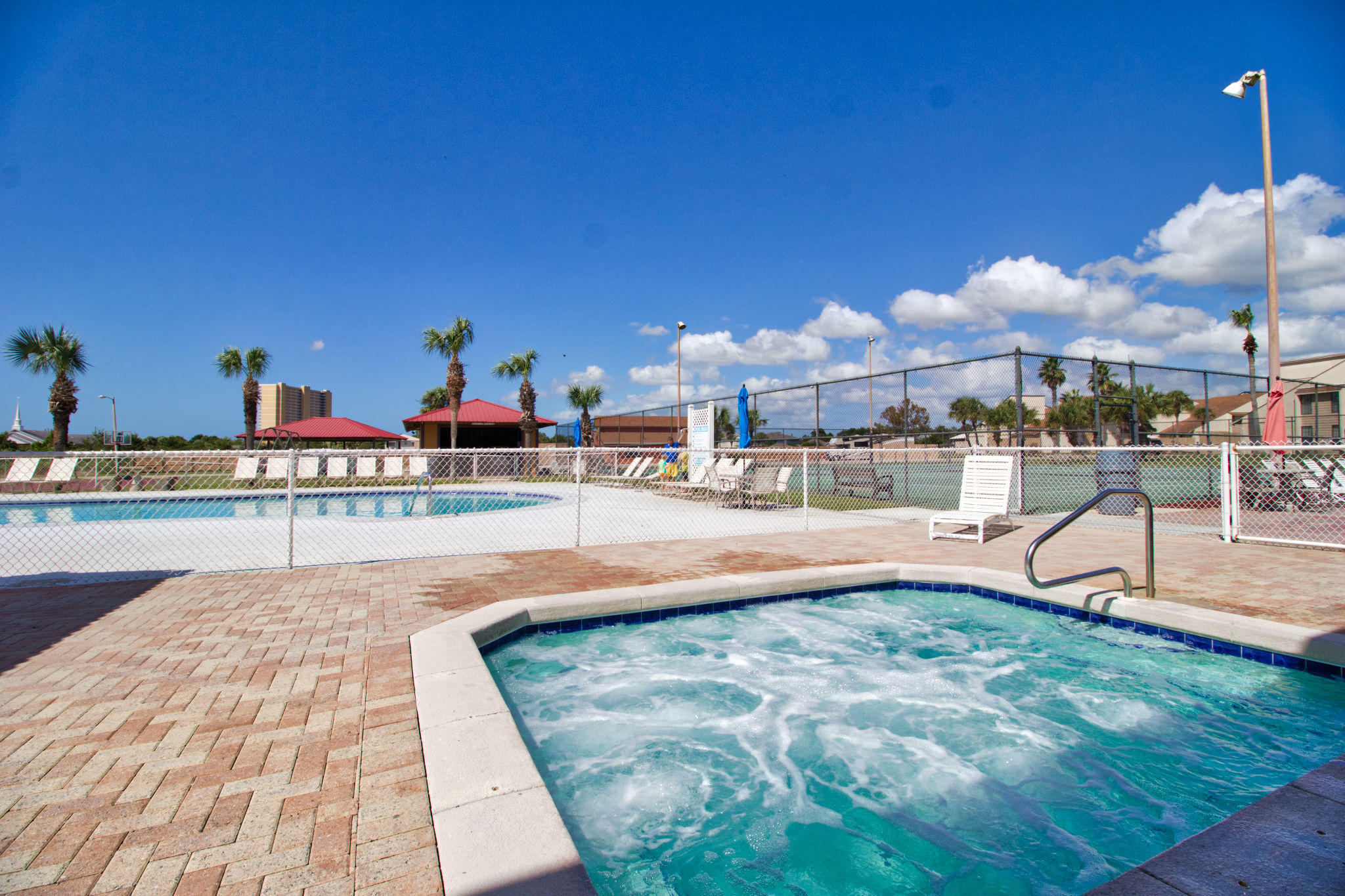 17462 Front Beach Road, Unit 77H Panama City Beach, FL 32413 - Photo 19 of 28 a swimming pool with view of a lake
