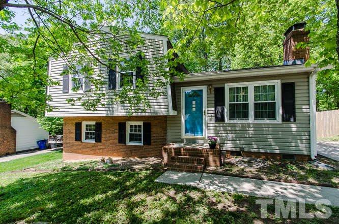 1020 Mockingbird Drive Raleigh, NC 27615 - Photo 1 of 25 a house view with a sitting space and garden