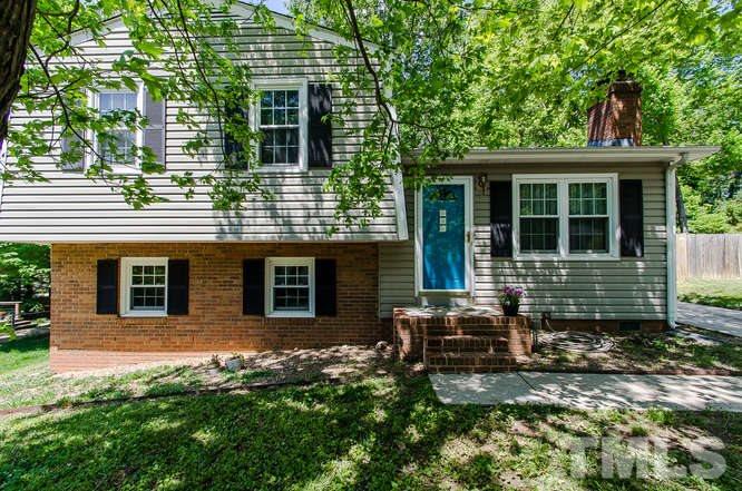 1020 Mockingbird Drive Raleigh, NC 27615 - Photo 3 of 25 a view of a house with a yard