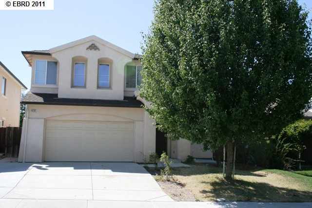4128 Mattole Road Antioch, CA 94531 - Photo 1 of 1 a front view of a house with trees