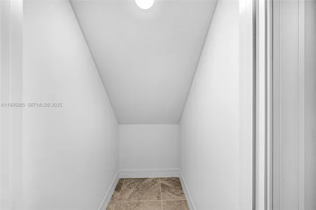 a view of small space with racks on the wall