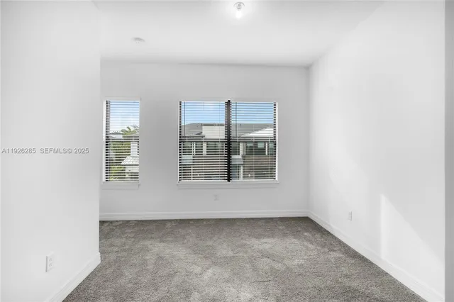 an empty room with an entryway