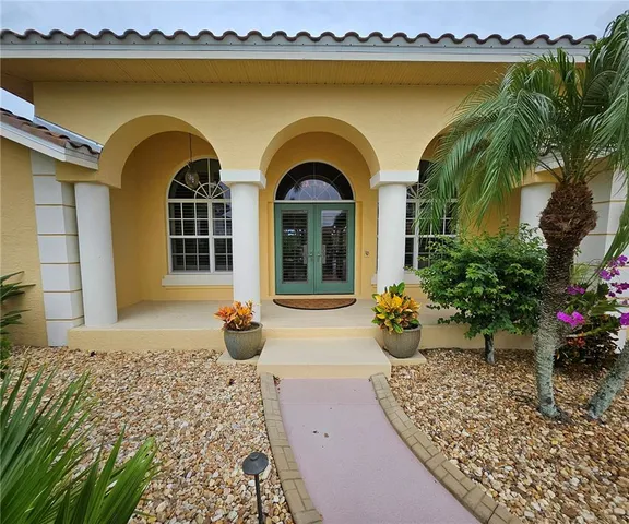 a front view of a house with patio