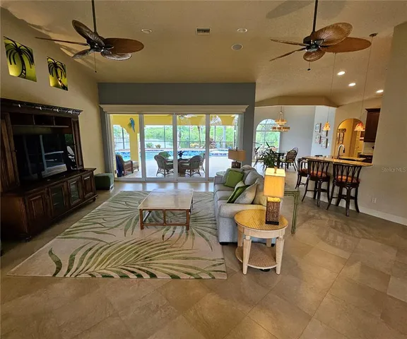 a view of a livingroom with furniture window and outside view