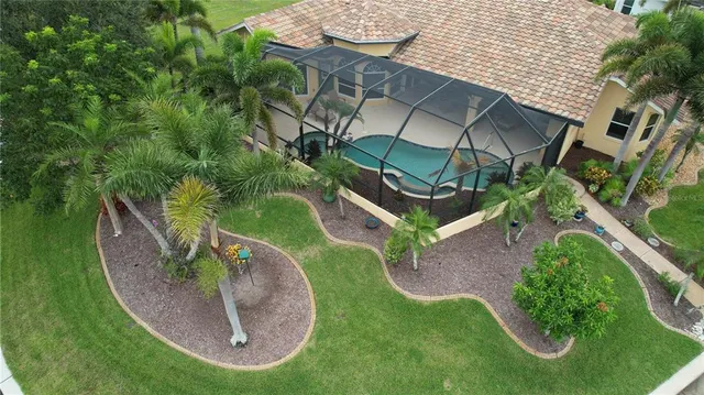 a view of a swimming pool with big yard