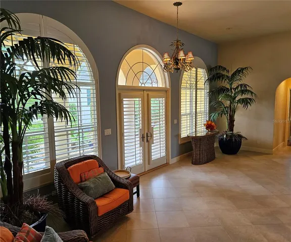 a view of lobby with furniture and floor to ceiling window