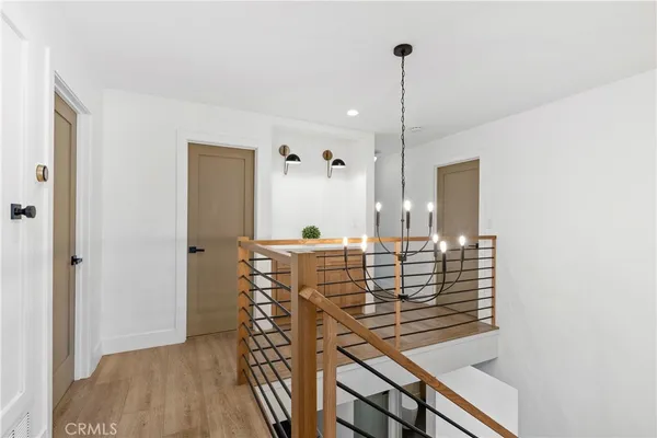 a view of hall way with furniture