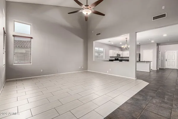 a view of a kitchen with a sink and a window