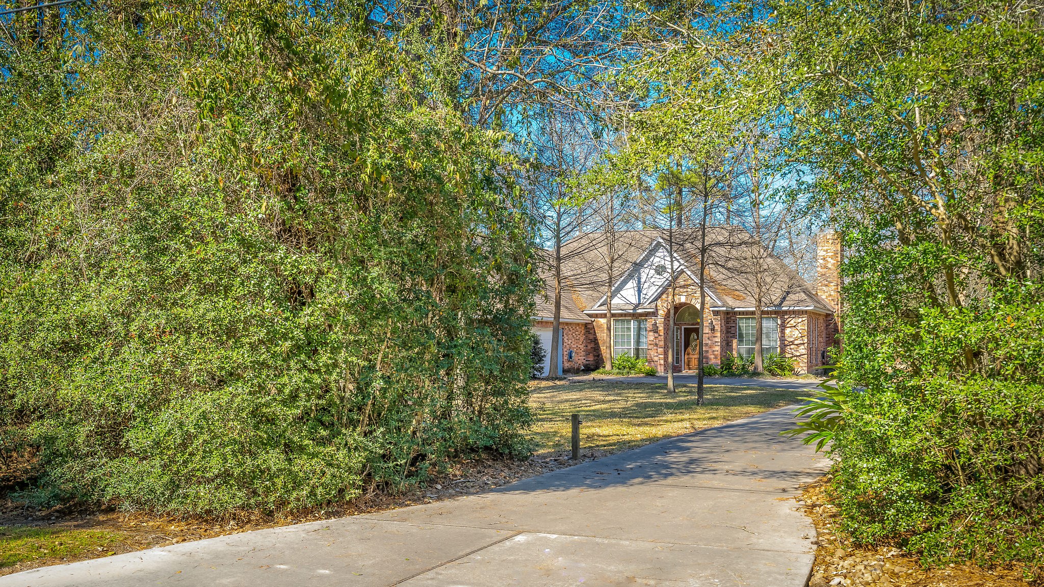 2500 Centerline Road Conroe, TX 77384 - Photo 1 of 28 a front view of a house with a yard