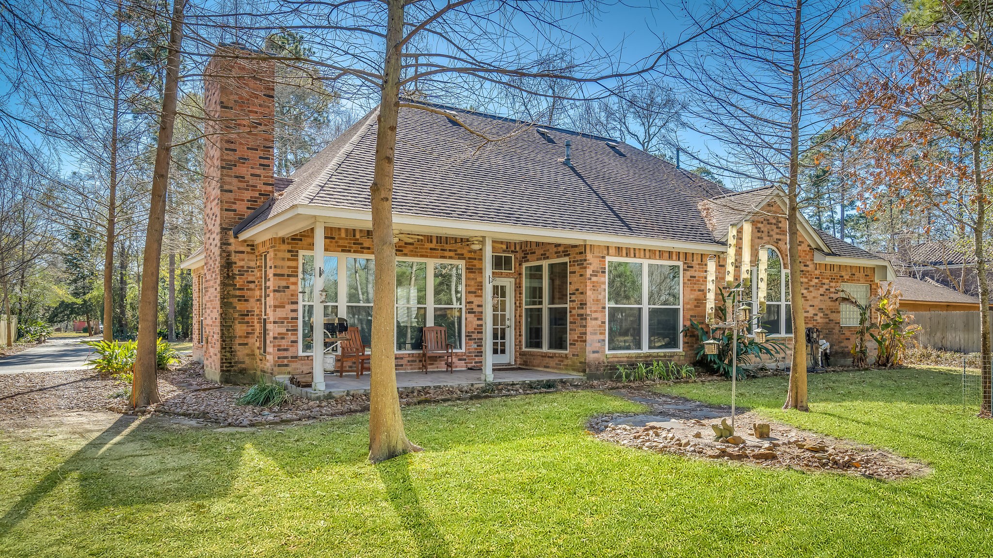 2500 Centerline Road Conroe, TX 77384 - Photo 24 of 28 a view of a house with backyard and sitting area