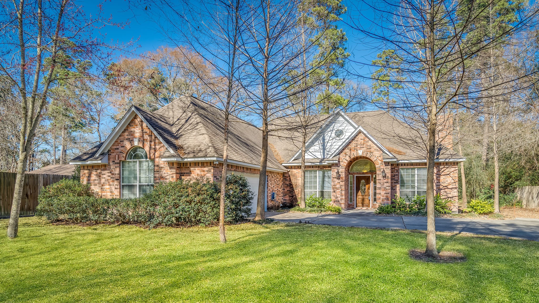 2500 Centerline Road Conroe, TX 77384 - Photo 3 of 28 a front view of a house with a yard