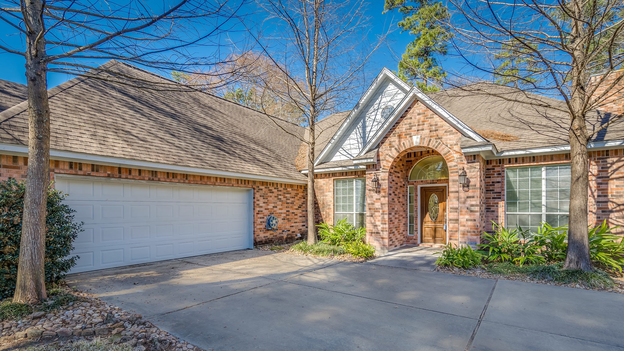 2500 Centerline Road Conroe, TX 77384 - Photo 4 of 28 a front view of a house with garden