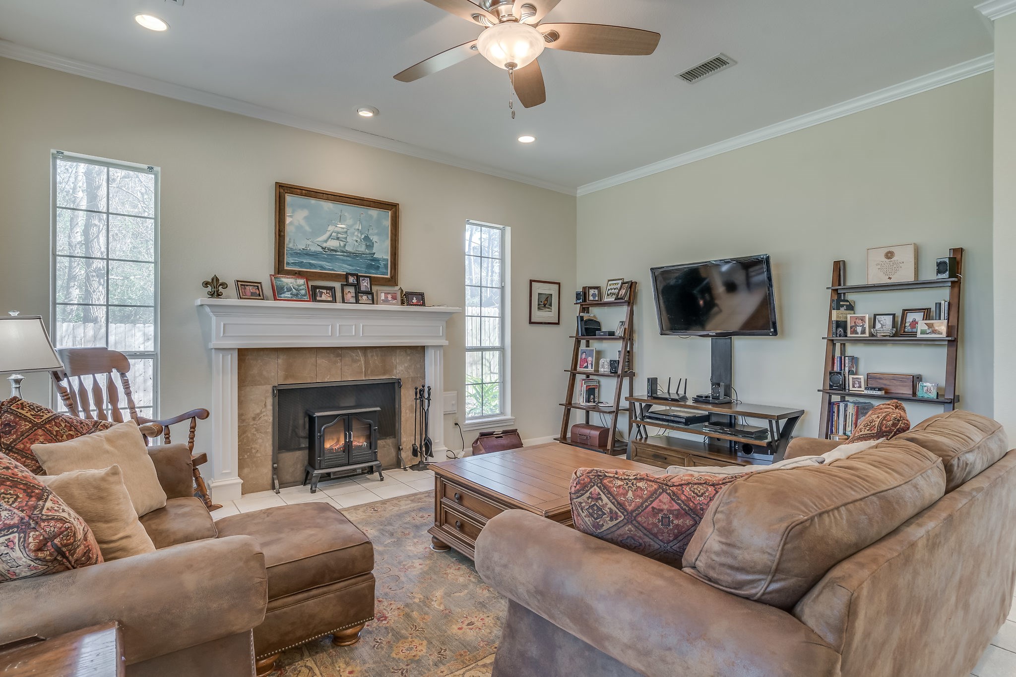2500 Centerline Road Conroe, TX 77384 - Photo 9 of 28 a living room with furniture and a fireplace