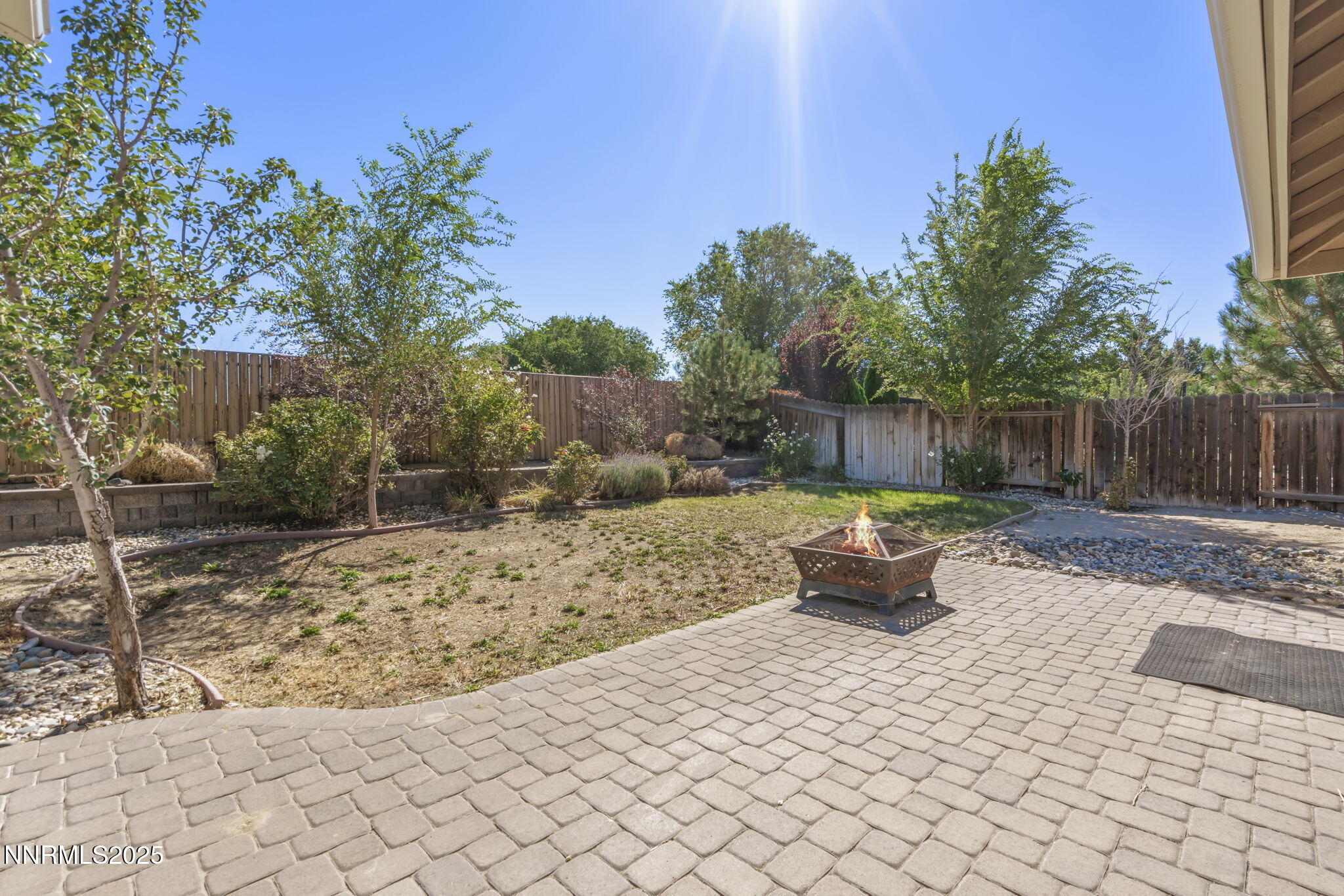 1187 Jasmine Lane Fernley, NV 89408 - Photo 18 of 22 a view of a backyard with furniture