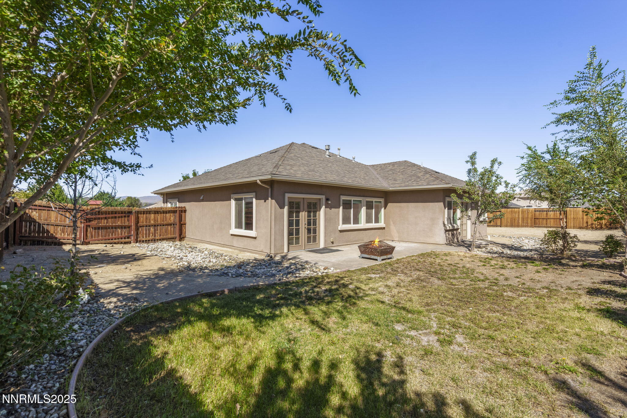 1187 Jasmine Lane Fernley, NV 89408 - Photo 19 of 22 a house with swimming pool in front of it