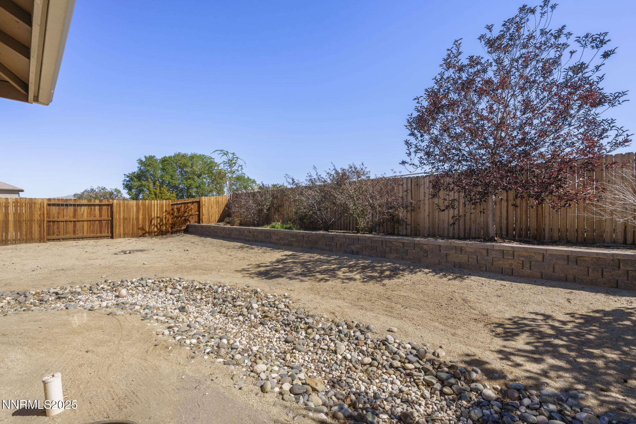 1187 Jasmine Lane Fernley, NV 89408 - Photo 21 of 22 a view of yard covered with snow in front of house