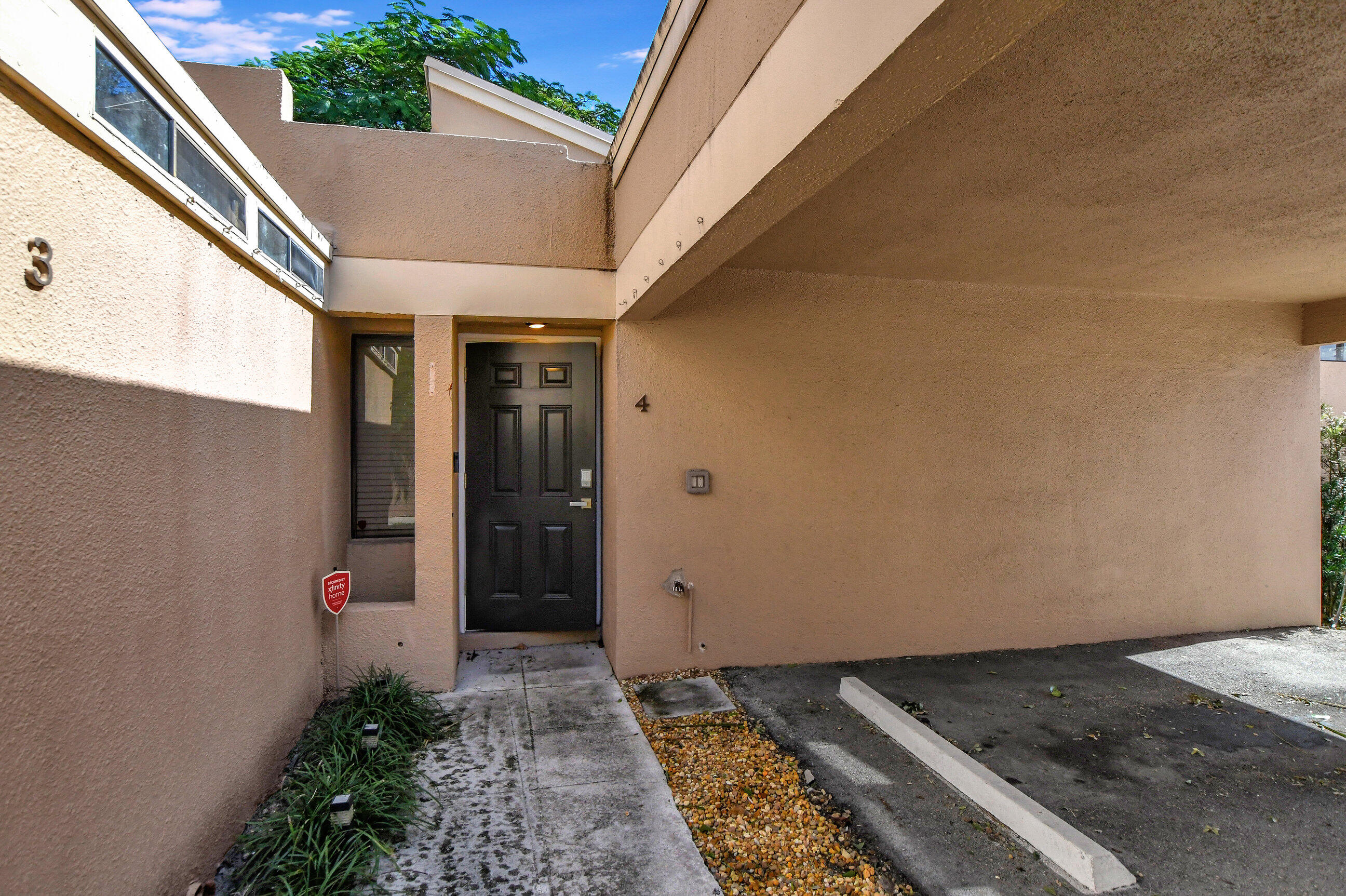 1061 Northwest 13th Street, Unit 4 Boca Raton, FL 33486 - Photo 2 of 26 front