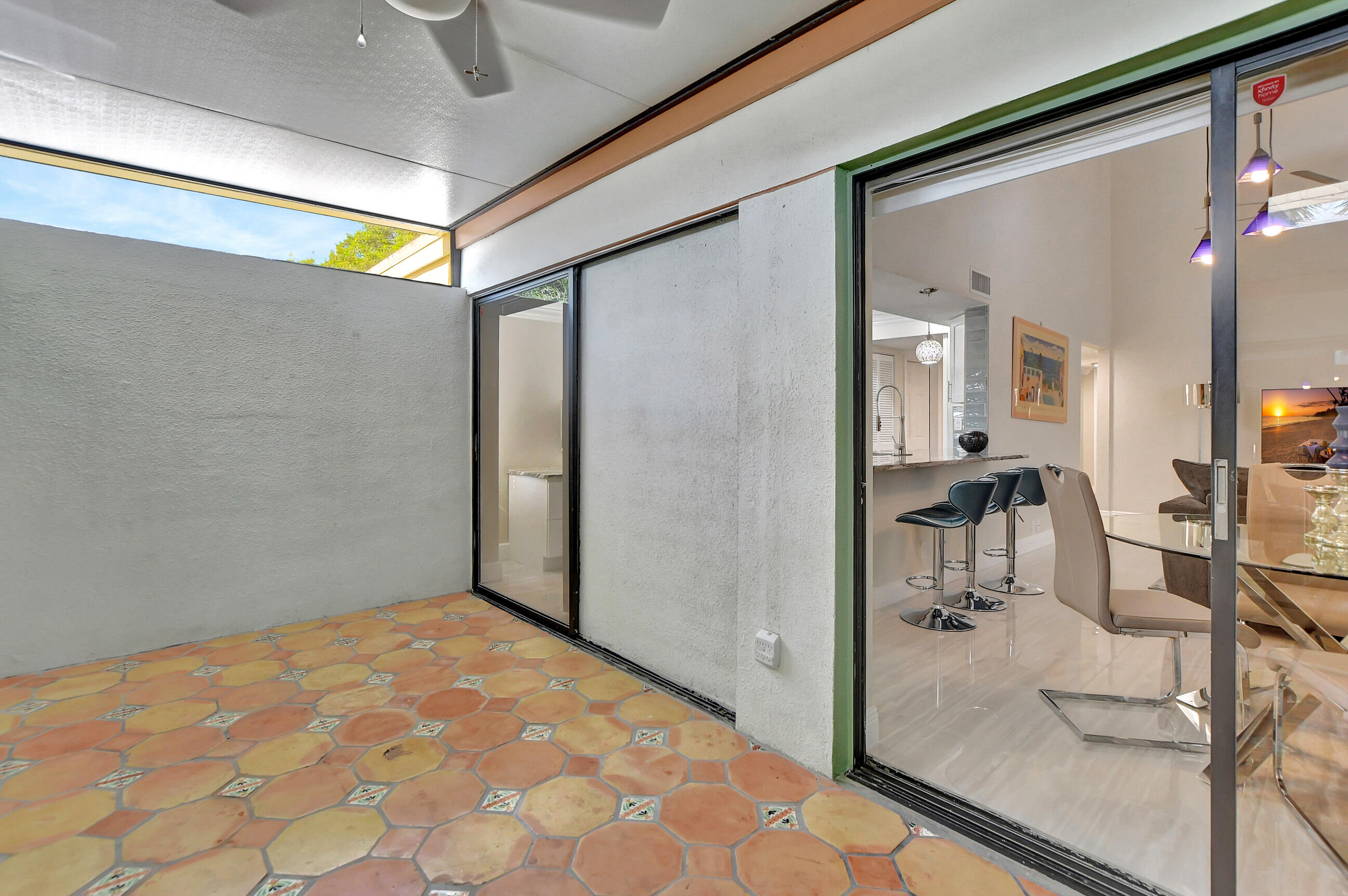 1061 Northwest 13th Street, Unit 4 Boca Raton, FL 33486 - Photo 23 of 26 sunroom