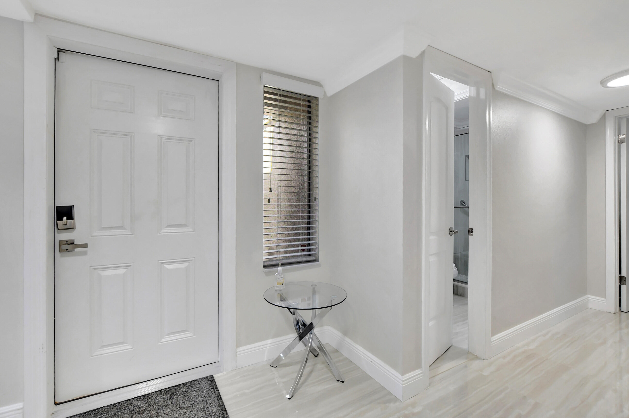 1061 Northwest 13th Street, Unit 4 Boca Raton, FL 33486 - Photo 3 of 26 foyer