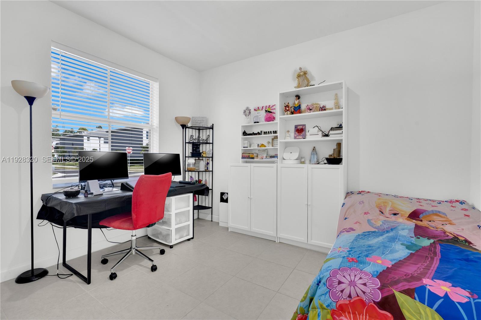 16266 Southwest 291st Street Homestead, FL 33033 - Photo 19 of 34 a bedroom with furniture and a window