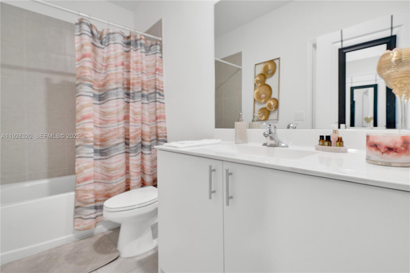 16266 Southwest 291st Street Homestead, FL 33033 - Photo 26 of 34 a bathroom with a sink toilet and shower