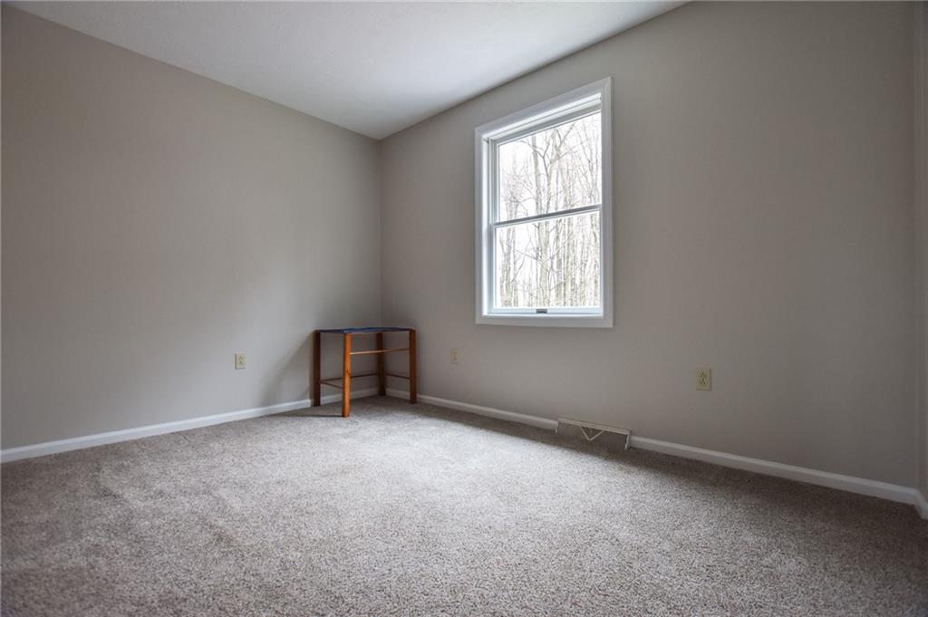 542 Fisher Road Cabot, PA 16023 - Photo 13 of 23 an empty room with a window