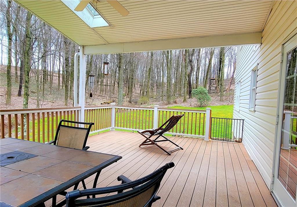 542 Fisher Road Cabot, PA 16023 - Photo 17 of 23 a view of a chairs and table on the wooden roof deck