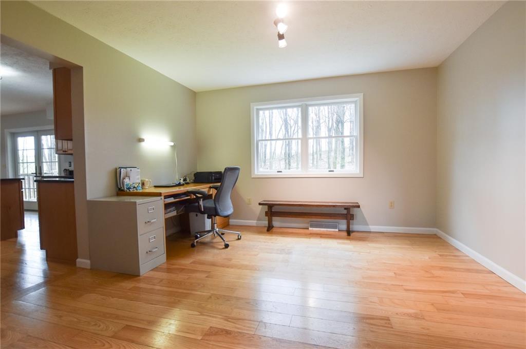 542 Fisher Road Cabot, PA 16023 - Photo 3 of 23 a view of a workspace with furniture and a window