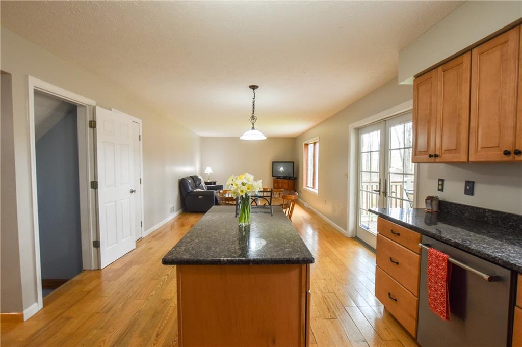 542 Fisher Road Cabot, PA 16023 - Photo 5 of 23 a large kitchen with granite countertop a large counter top appliances and cabinets
