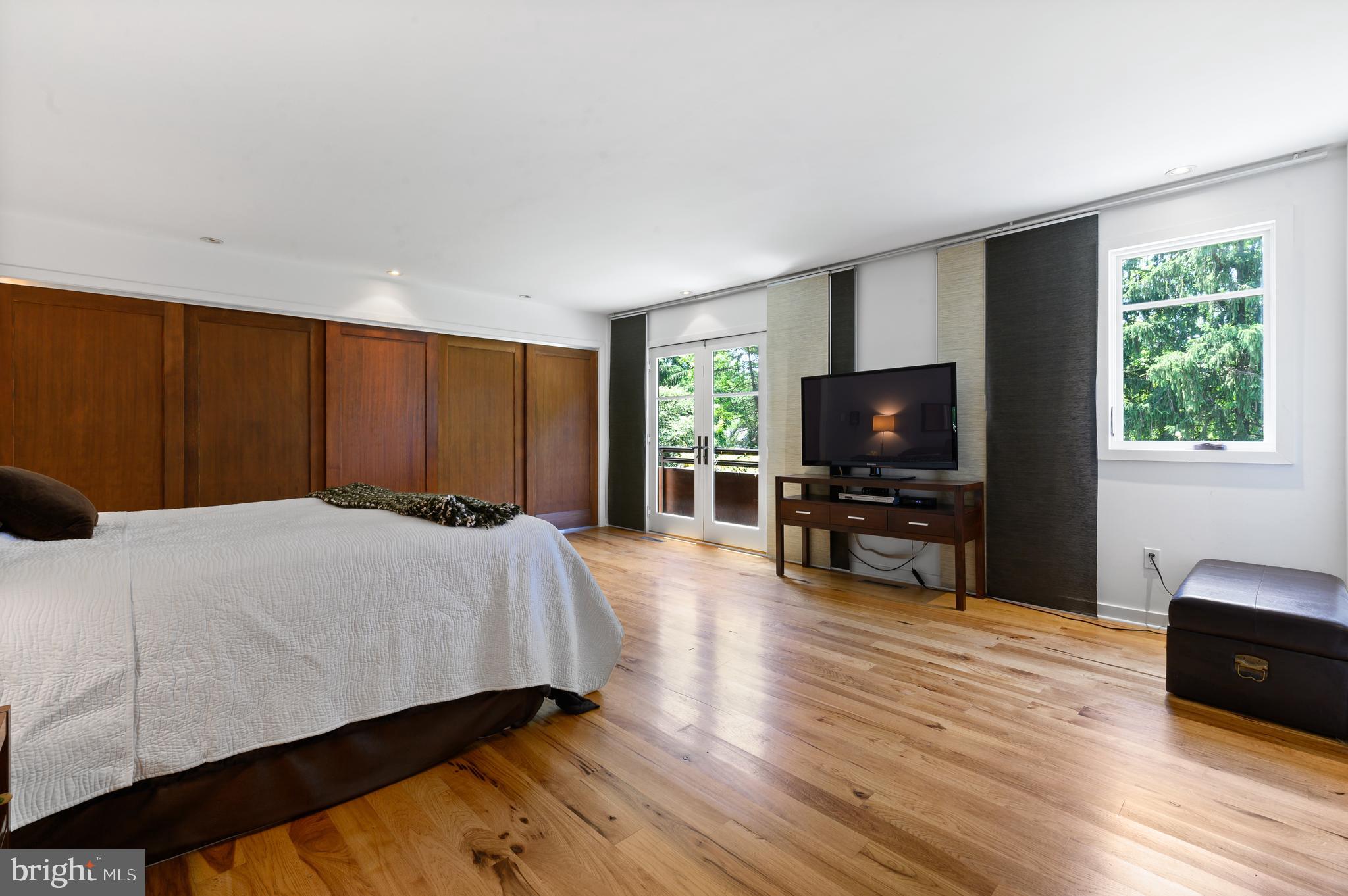 350 Berkley Road Devon, PA 19333 - Photo 22 of 43 a bedroom with a bed and a flat screen television