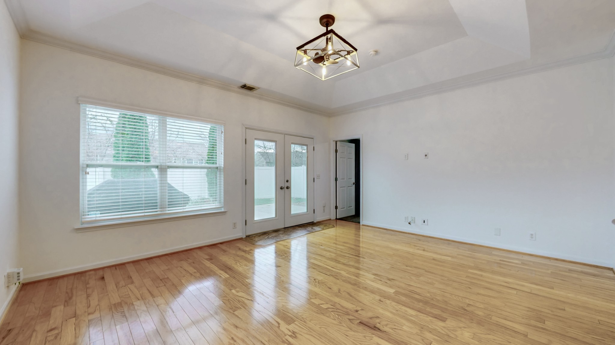 1098 Misty Morn Circle Spring Hill, TN 37174 - Photo 12 of 23 wooden floor in an empty room with a window