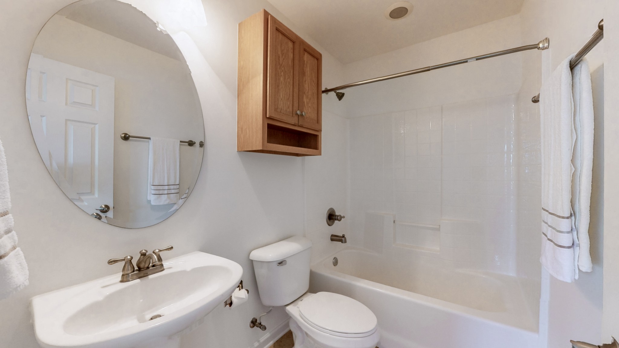 1098 Misty Morn Circle Spring Hill, TN 37174 - Photo 17 of 23 a bathroom with a sink toilet and shower