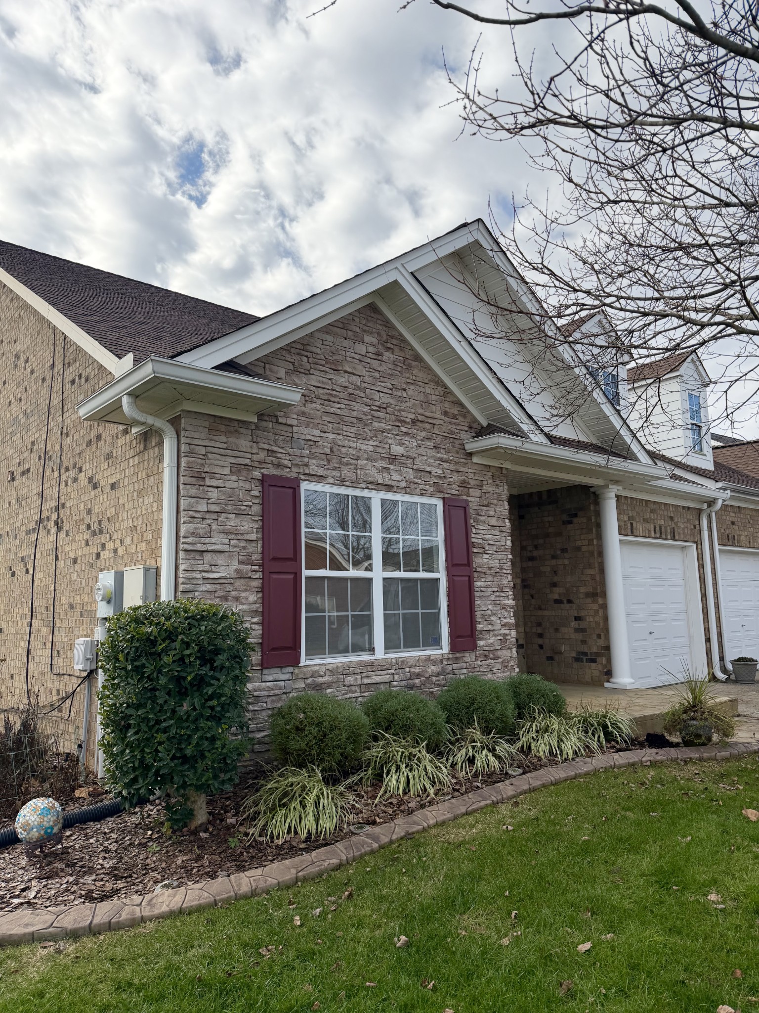 1098 Misty Morn Circle Spring Hill, TN 37174 - Photo 2 of 3 a front view of a house with a garden