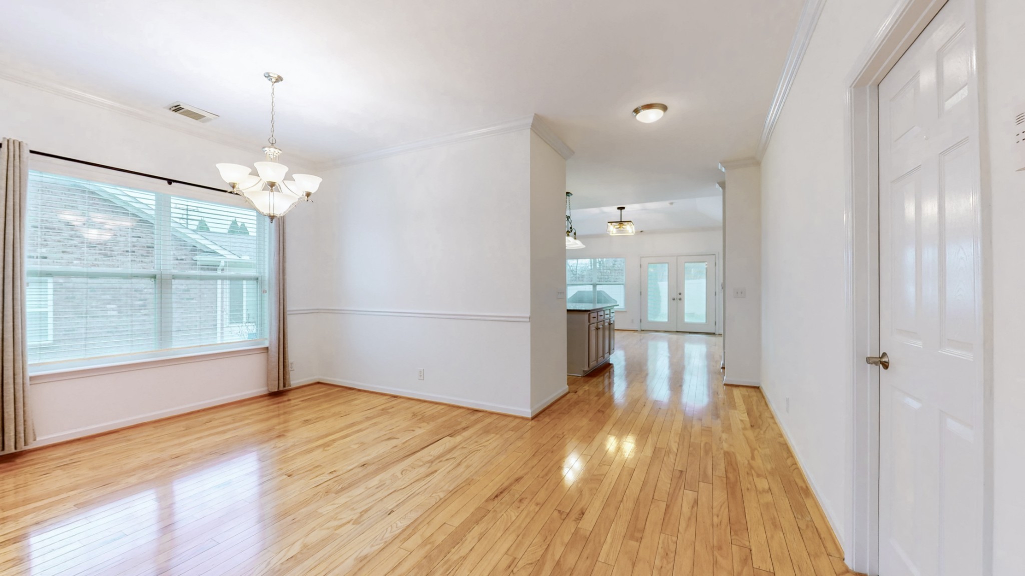 1098 Misty Morn Circle Spring Hill, TN 37174 - Photo 6 of 23 a view of a room with wooden floor and windows