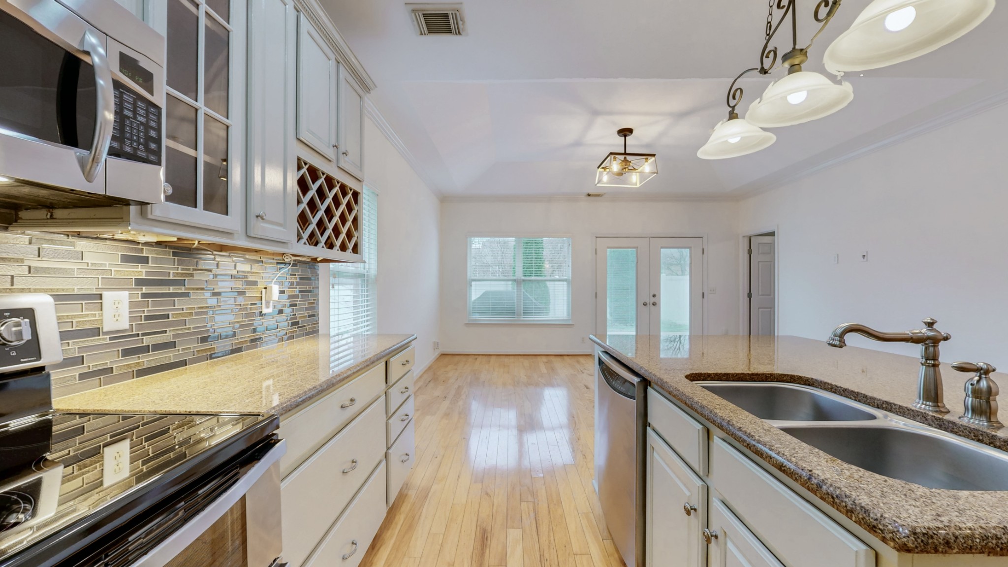 1098 Misty Morn Circle Spring Hill, TN 37174 - Photo 10 of 23 a kitchen with stainless steel appliances granite countertop a sink and stove