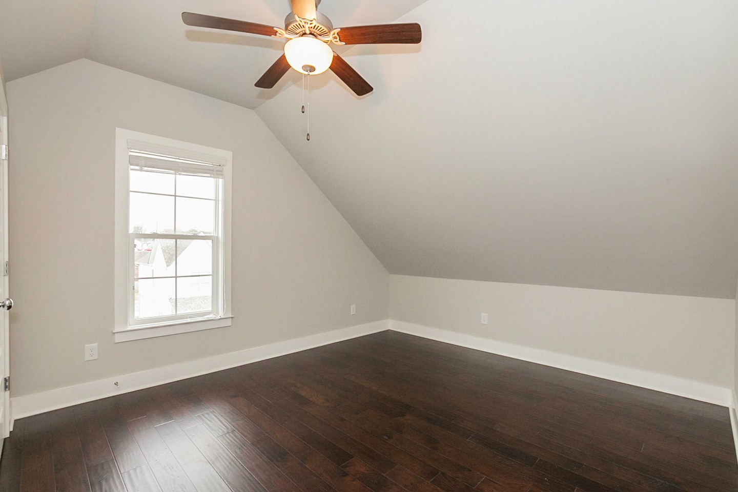 703 Cottage Park Drive Nashville, TN 37207 - Photo 12 of 15 an empty room with wooden floor fan and windows