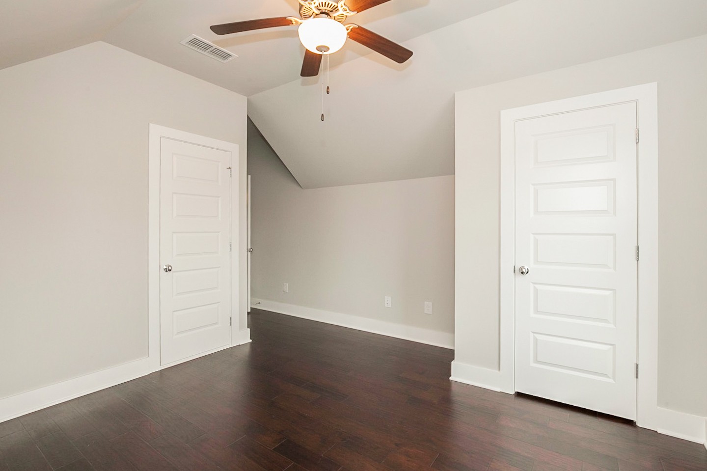 703 Cottage Park Drive Nashville, TN 37207 - Photo 13 of 15 an empty room with wooden floor fan and windows