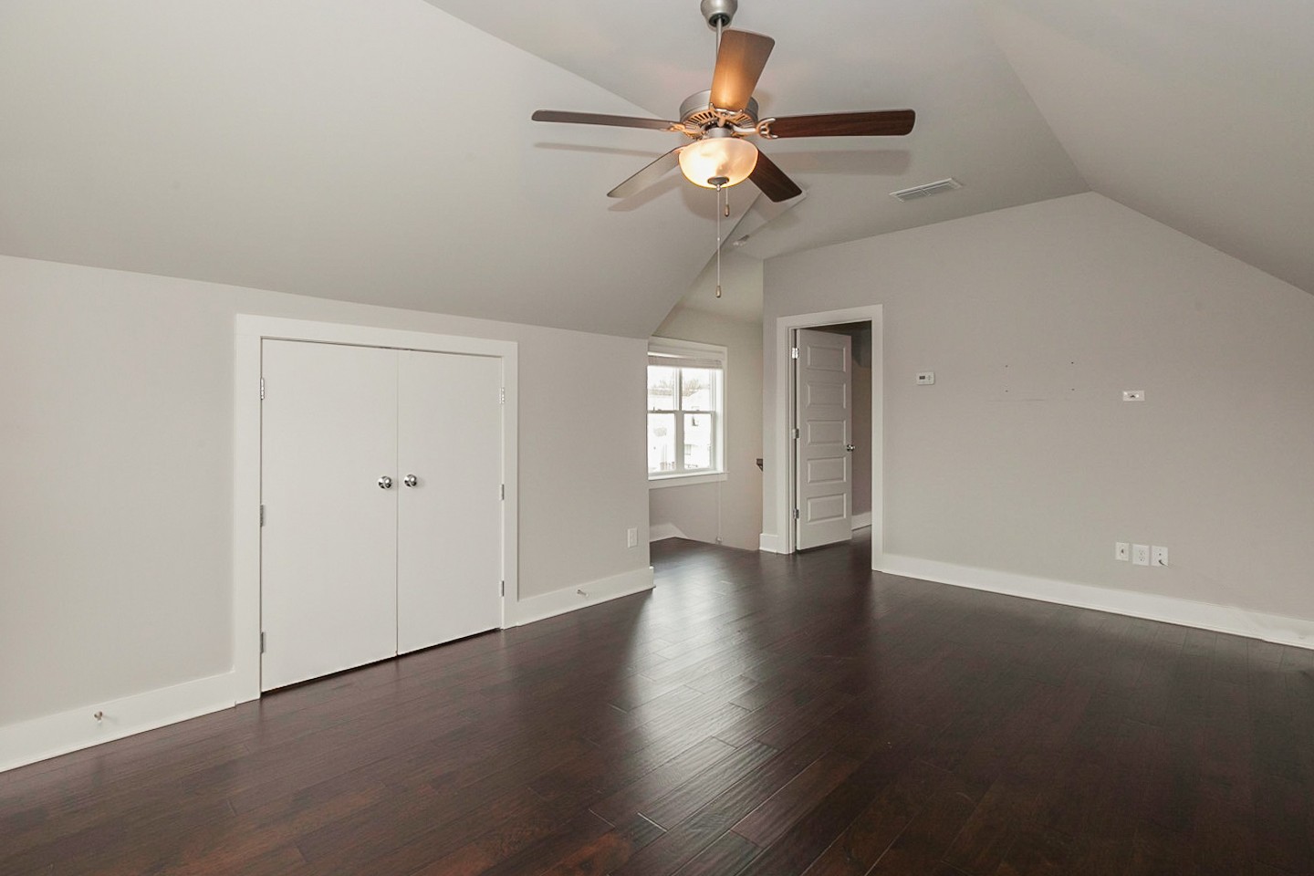 703 Cottage Park Drive Nashville, TN 37207 - Photo 15 of 15 an empty room with wooden floor fan and windows
