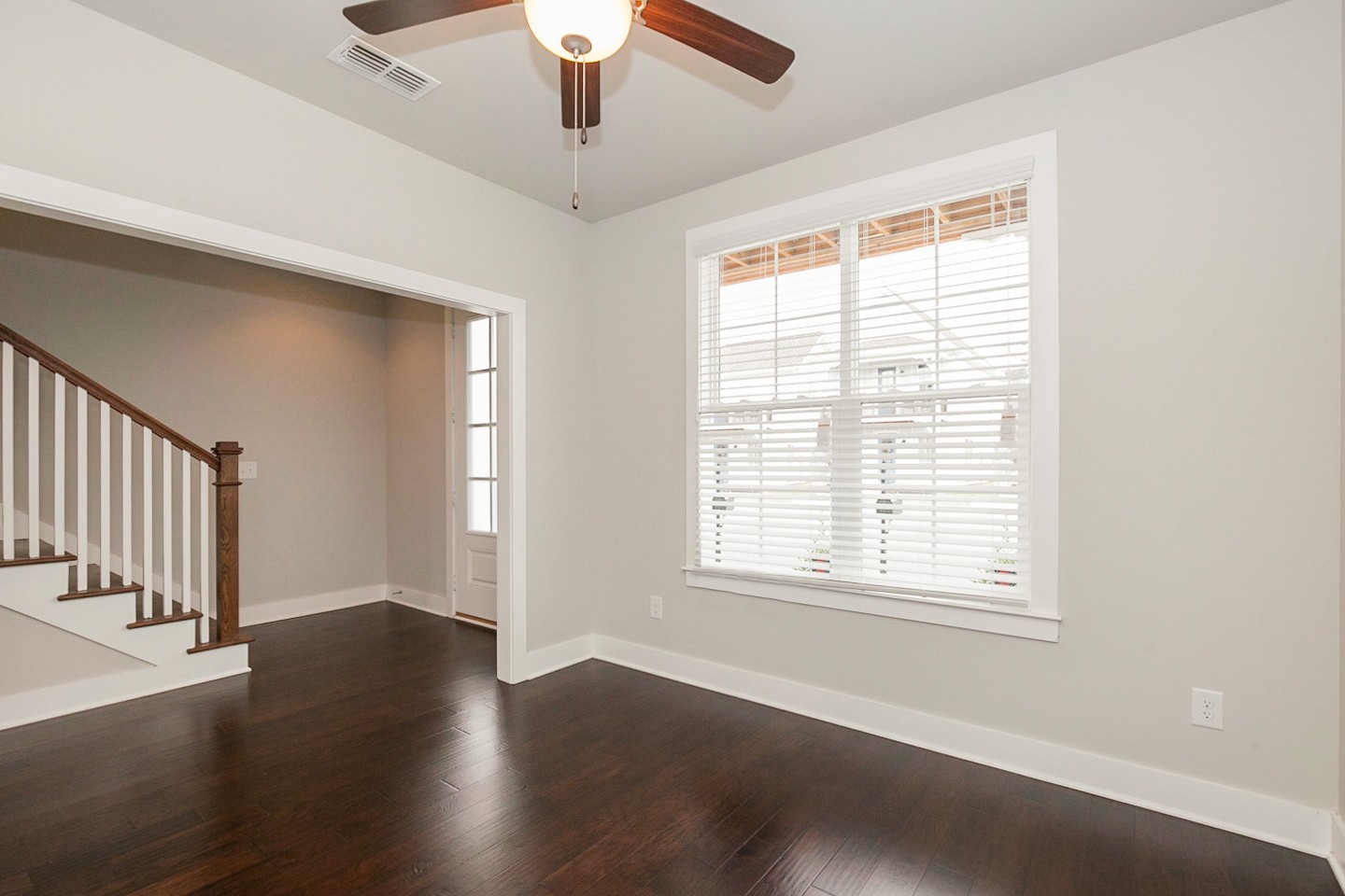 703 Cottage Park Drive Nashville, TN 37207 - Photo 6 of 15 an empty room with wooden floor and windows