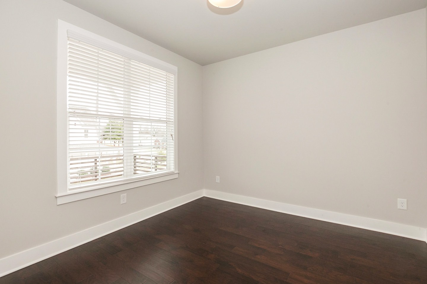 703 Cottage Park Drive Nashville, TN 37207 - Photo 9 of 15 an empty room with wooden floor and windows