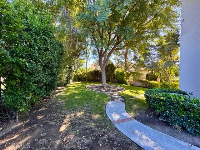 a view of a lake with trees in the background