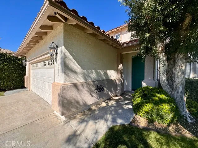 a view of a house with a garden